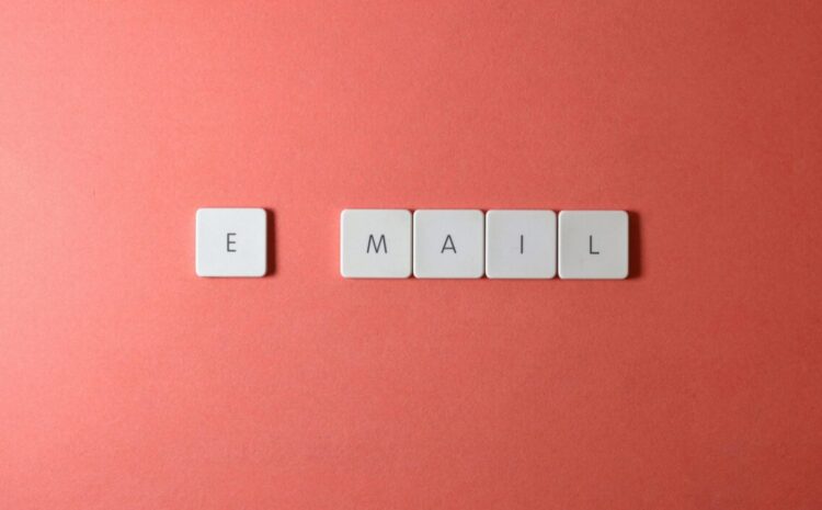 Flat lay of keyboard letter tiles spelling 'email' on coral backdrop. — Photo by Miguel Á. Padriñán on Pexels