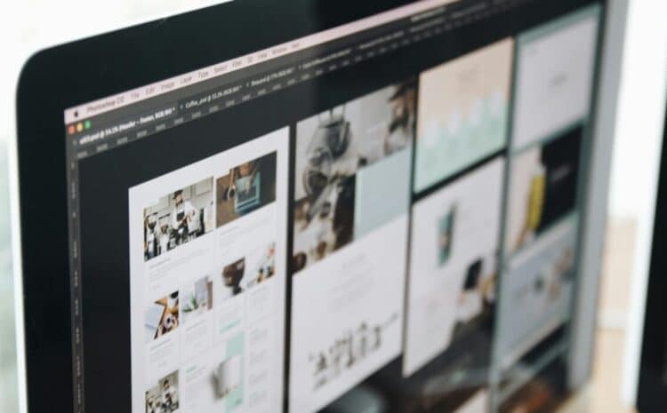 A modern computer screen displaying web design work, showcasing creative visuals in a workspace. — Photo by Tranmautritam on Pexels