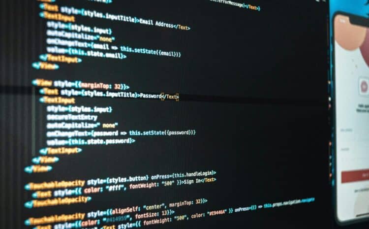 Computer screen with program code and app during work in workplace of modern office — Photo by Rodrigo Santos on Pexels