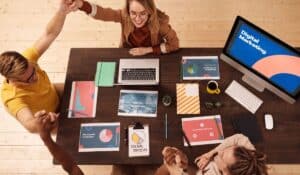 Colleagues celebrating success in a modern digital marketing office with teamwork and collaboration. — Photo by Mikael Blomkvist on Pexels