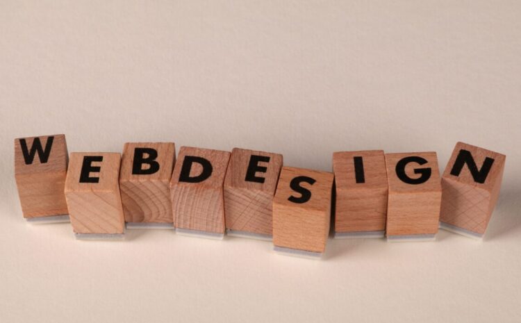 Wooden blocks spelling 'web design' creatively showcase digital design concept. — Photo by Ann H on Pexels
