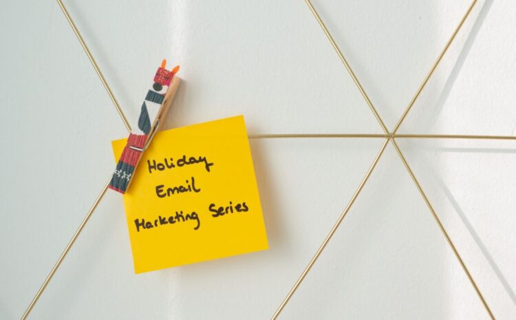 Bright yellow sticky note with holiday email marketing message clipped to a wireframe wall. — Photo by Walls.io on Pexels