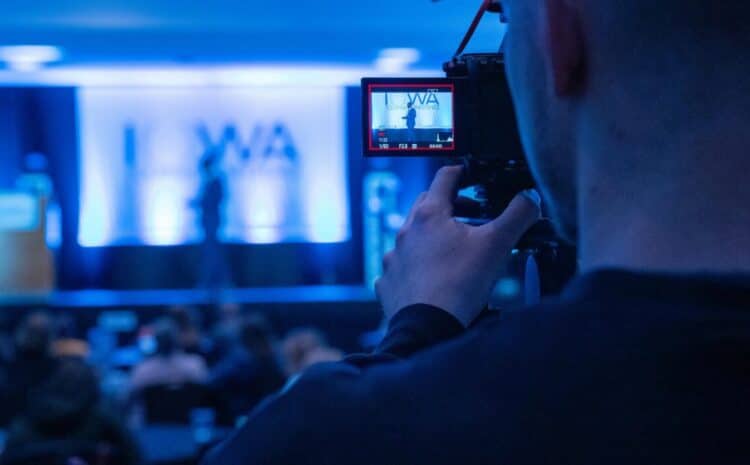 Capturing a conference event with a focus on professional videography services. — Photo by BEIGE MEDIA on Pexels